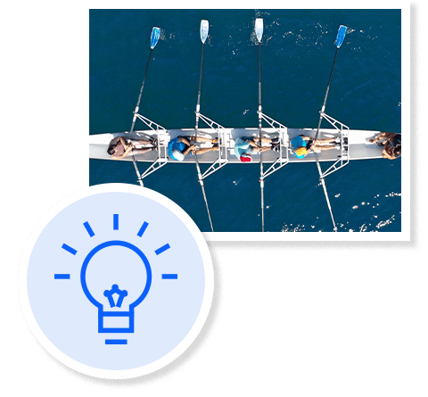 Photo of top view onto competing rowing boat, with icon of a light bulb